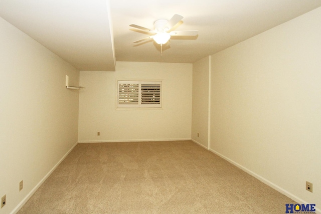 6427 Lone Tree Dr, Lincoln, NE 68512 - spare room with light carpet, baseboards, and ceiling fan