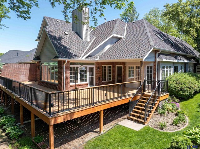 6427 Lone Tree Dr, Lincoln, NE 68512 - back of property with brick siding, roof with shingles, a chimney, a wooden deck, and stairs