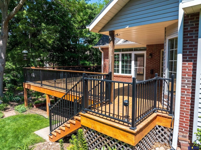 6427 Lone Tree Dr, Lincoln, NE 68512 - wooden terrace with stairway and a sunroom