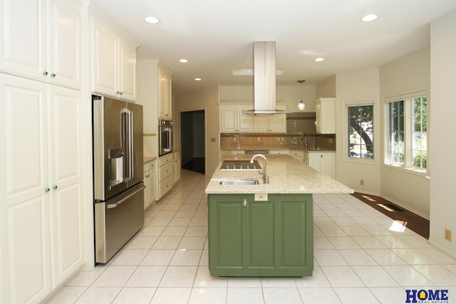 6427 Lone Tree Dr, Lincoln, NE 68512 - kitchen featuring appliances with stainless steel finishes, a sink, backsplash, light tile patterned floors, and recessed lighting