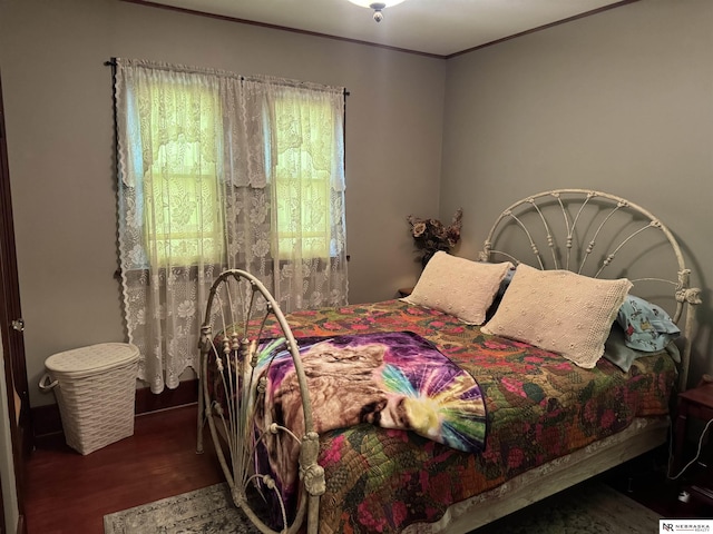 1244 N Elm St, Wahoo, NE 68066 - bedroom with wood finished floors and crown molding
