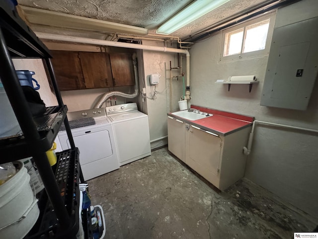 1244 N Elm St, Wahoo, NE 68066 - laundry area featuring washer and clothes dryer, cabinet space, and electric panel