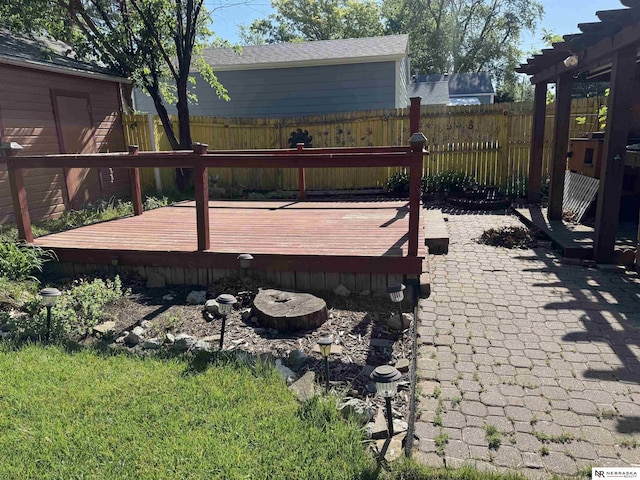1244 N Elm St, Wahoo, NE 68066 - wooden deck with a fenced backyard