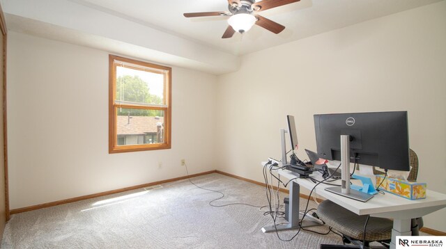 719 Cory Dr, Seward, NE 68434 - unfurnished office with carpet, baseboards, and a ceiling fan