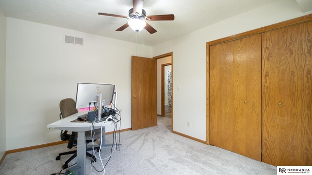 719 Cory Dr, Seward, NE 68434 - carpeted home office with ceiling fan and baseboards