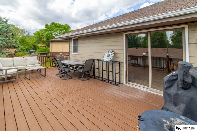 719 Cory Dr, Seward, NE 68434 - wooden terrace with outdoor dining area and an outdoor living space
