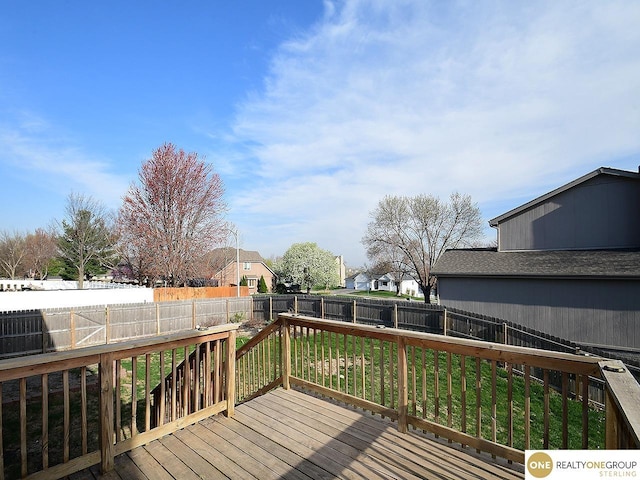 wooden deck with a residential view