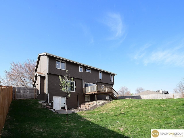 rear view of house featuring stairway and a wooden deck
