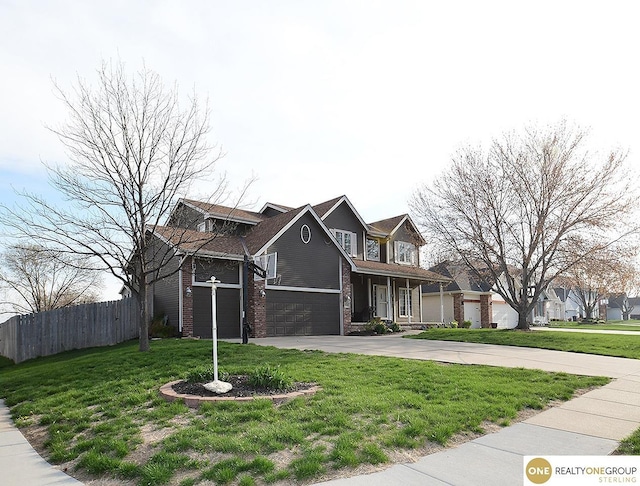view of front of home featuring an attached garage, brick siding, and concrete driveway