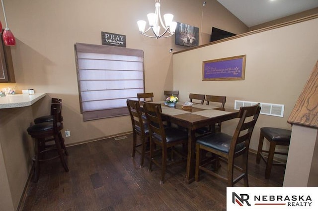14311 Oldfield St, Waverly, NE 68462 - dining space featuring wood finished floors, a chandelier, baseboards, and vaulted ceiling
