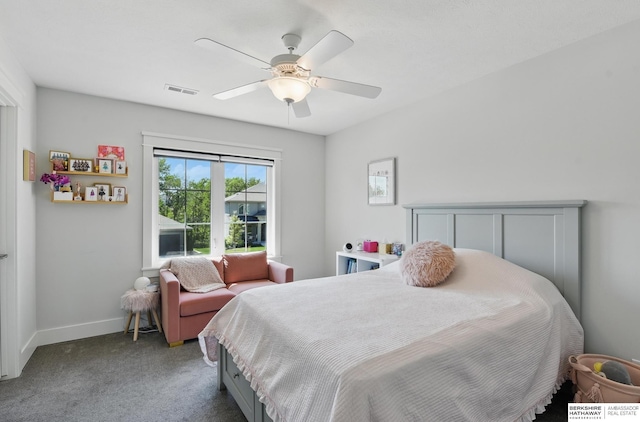 bedroom featuring carpet floors, a ceiling fan, and baseboards