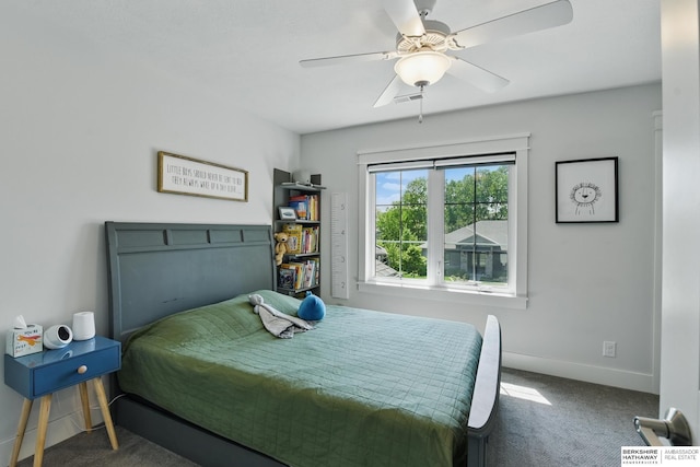 bedroom with carpet, baseboards, and ceiling fan