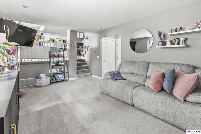 18667 R St, Omaha, NE 68135 - living room featuring carpet flooring, stairs, and baseboards