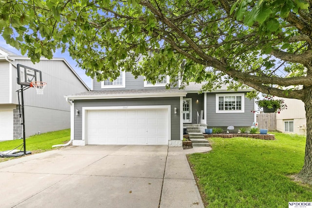 18667 R St, Omaha, NE 68135 - view of front facade with a front lawn, an attached garage, and concrete driveway