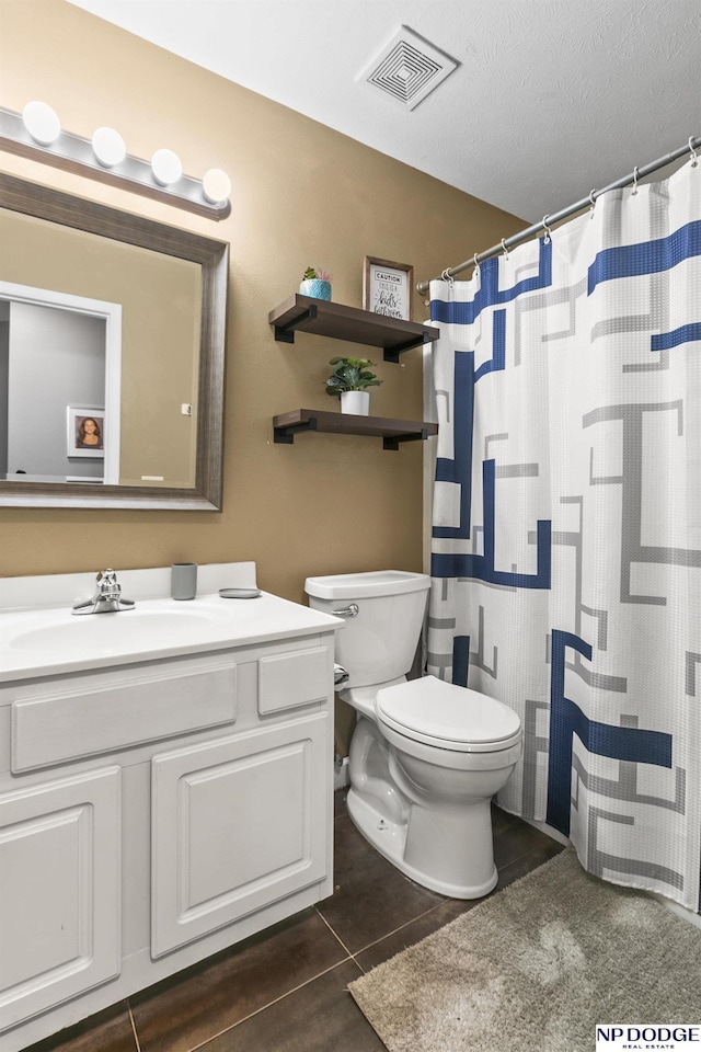 18667 R St, Omaha, NE 68135 - bathroom featuring toilet, vanity, tile patterned floors, and a shower with shower curtain