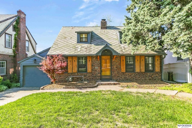 view of front facade with concrete driveway, brick siding, a chimney, and a garage