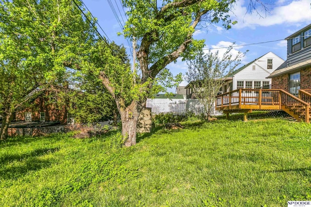 view of yard with a deck