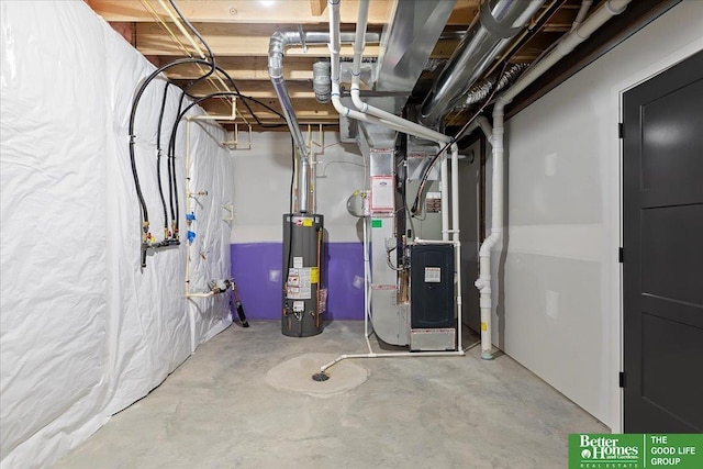 utility room featuring gas water heater and heating unit