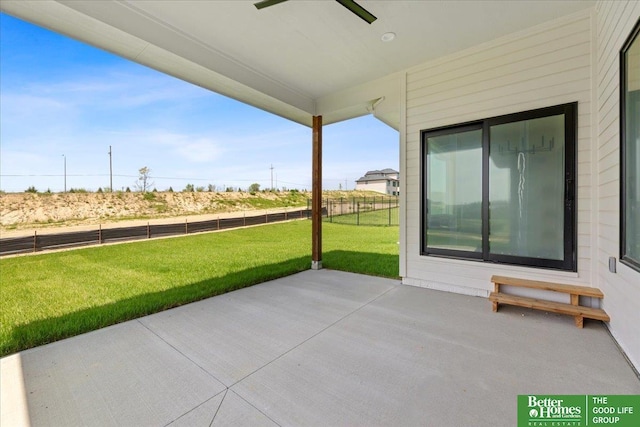 view of patio featuring ceiling fan