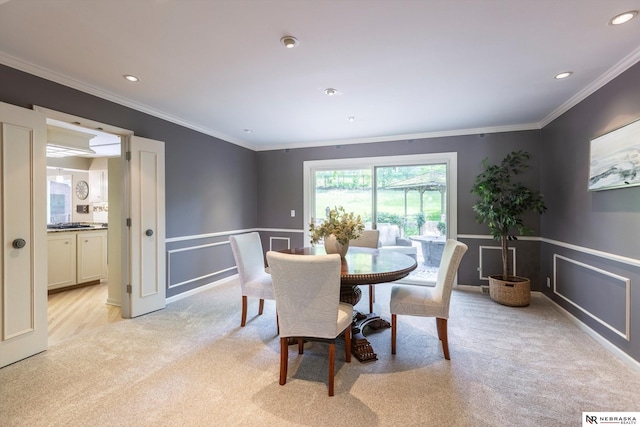 9723 Fieldcrest Dr, Omaha, NE 68114 - dining room with light carpet, crown molding, a wainscoted wall, a decorative wall, and recessed lighting
