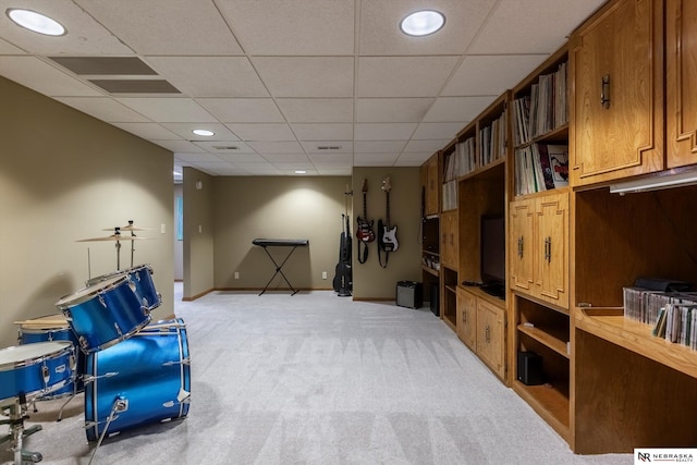 9723 Fieldcrest Dr, Omaha, NE 68114 - playroom with light carpet, a paneled ceiling, baseboards, and recessed lighting