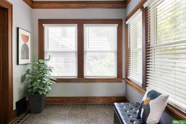 319 N 37th St, Omaha, NE 68131 - living area featuring baseboards and speckle patterned floor