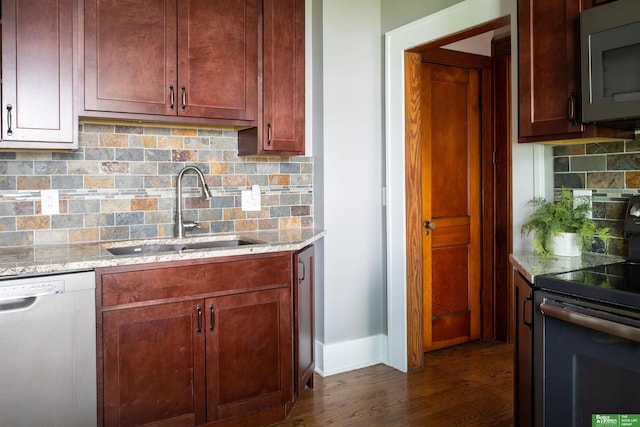 319 N 37th St, Omaha, NE 68131 - kitchen featuring dishwashing machine, electric range, a sink, stainless steel microwave, and dark wood finished floors