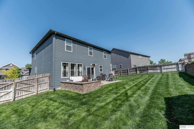 back of property featuring a patio