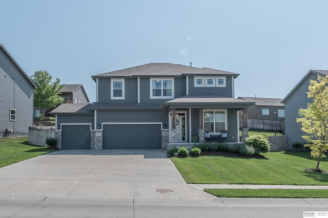 view of front of house featuring covered porch, driveway, and an attached garage