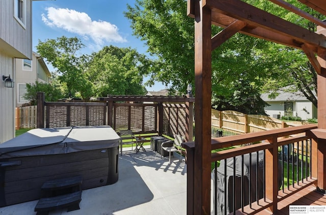 2103 John St, Papillion, NE 68133 - view of patio featuring a hot tub