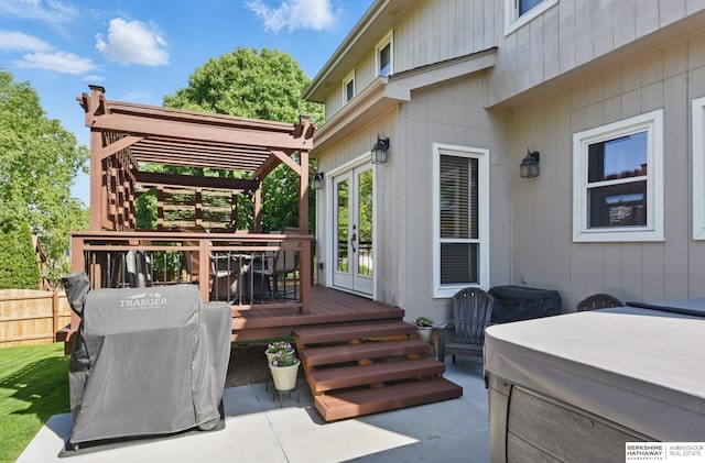 2103 John St, Papillion, NE 68133 - deck with french doors, a hot tub, a pergola, outdoor dining space, and a patio area