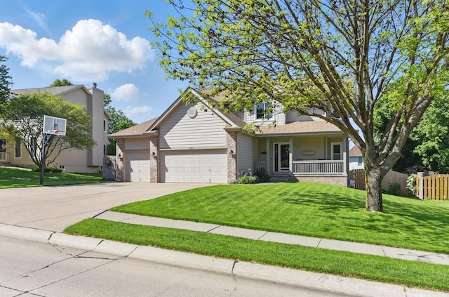 2103 John St, Papillion, NE 68133 - view of front of property with an attached garage, brick siding, driveway, and covered porch