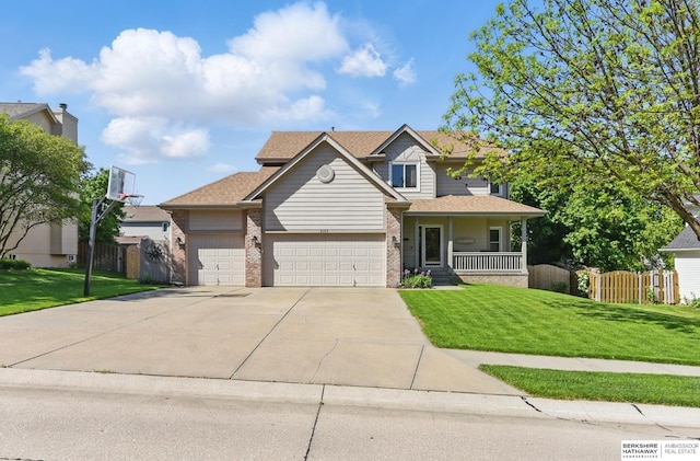 2103 John St, Papillion, NE 68133 - traditional-style home with an attached garage, concrete driveway, covered porch, and brick siding