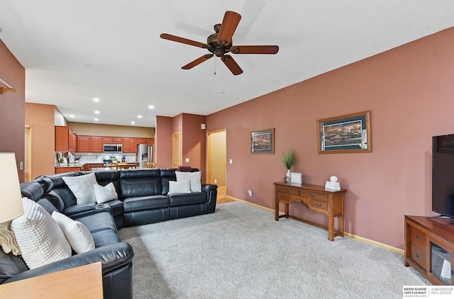 2103 John St, Papillion, NE 68133 - living room with ceiling fan, light carpet, baseboards, and recessed lighting