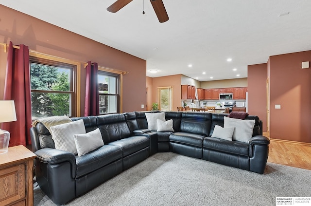 2103 John St, Papillion, NE 68133 - living area featuring ceiling fan, recessed lighting, and light carpet