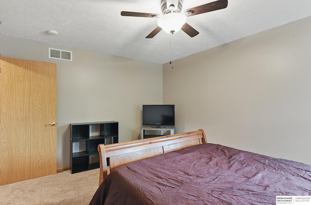 2103 John St, Papillion, NE 68133 - carpeted bedroom featuring a ceiling fan