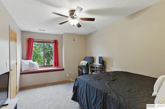 2103 John St, Papillion, NE 68133 - bedroom with carpet, baseboards, ceiling fan, an office area, and a textured ceiling