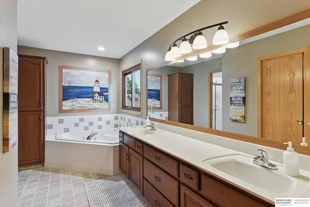 2103 John St, Papillion, NE 68133 - bathroom featuring a garden tub, double vanity, and tile patterned floors