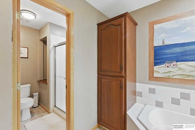 2103 John St, Papillion, NE 68133 - full bath with toilet, tile patterned floors, a bath, a stall shower, and baseboards