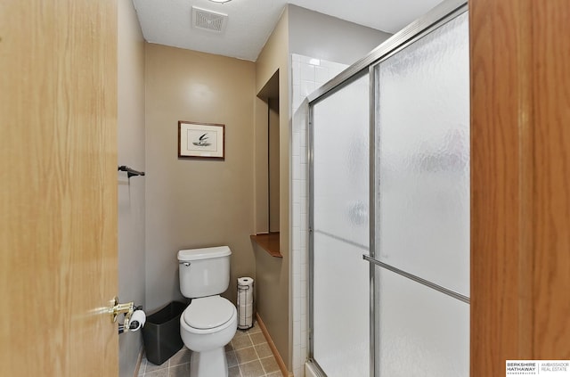 2103 John St, Papillion, NE 68133 - full bathroom featuring toilet, a shower stall, and baseboards