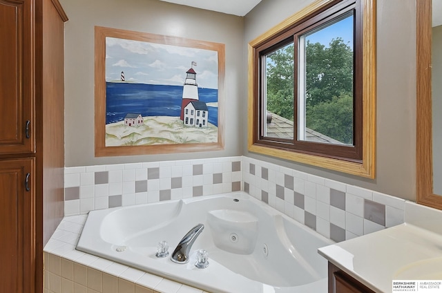 2103 John St, Papillion, NE 68133 - full bathroom with a tub with jets and vanity