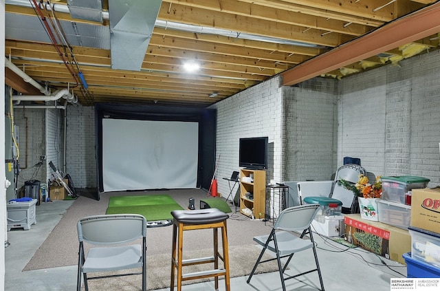 2103 John St, Papillion, NE 68133 - rec room with brick wall