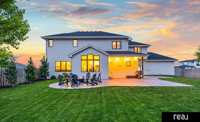 18880 Patrick Cir, Elkhorn, NE 68022 - back of property at dusk with a patio area