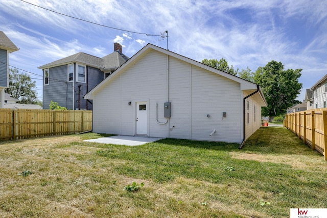 back of house featuring a patio