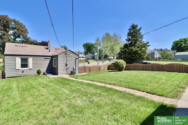 view of yard featuring central AC unit