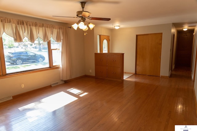 5 Fairview Dr, York, NE 68467 - unfurnished bedroom with light wood-type flooring, baseboards, and a ceiling fan