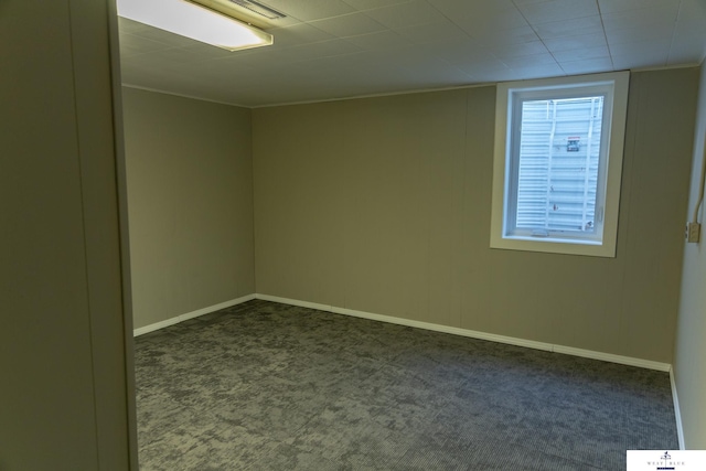 5 Fairview Dr, York, NE 68467 - unfurnished room featuring dark colored carpet and baseboards