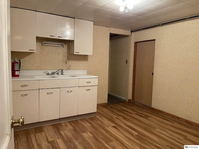 1801 Franklin St, Bellevue, NE 68005 - kitchen featuring a sink, light countertops, and light wood-style floors