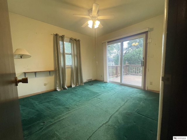 1801 Franklin St, Bellevue, NE 68005 - empty room featuring plenty of natural light, a ceiling fan, carpet, and baseboards