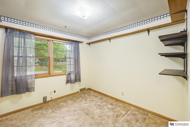 1801 Franklin St, Bellevue, NE 68005 - empty room featuring baseboards and light carpet